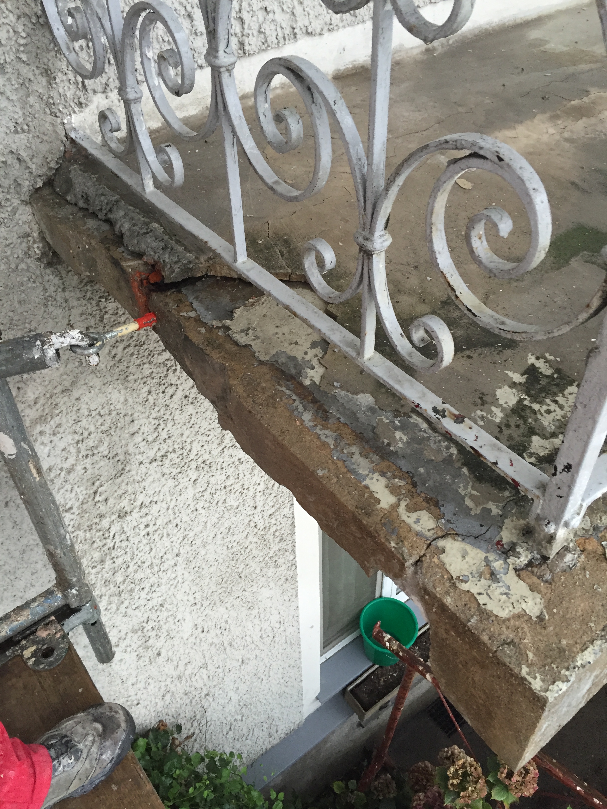 Balcony renovation with concrete damage